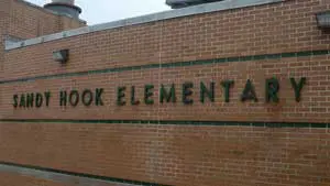 Sandy_Hook_Elementary-s A brick wall with the words " brook elementary ".